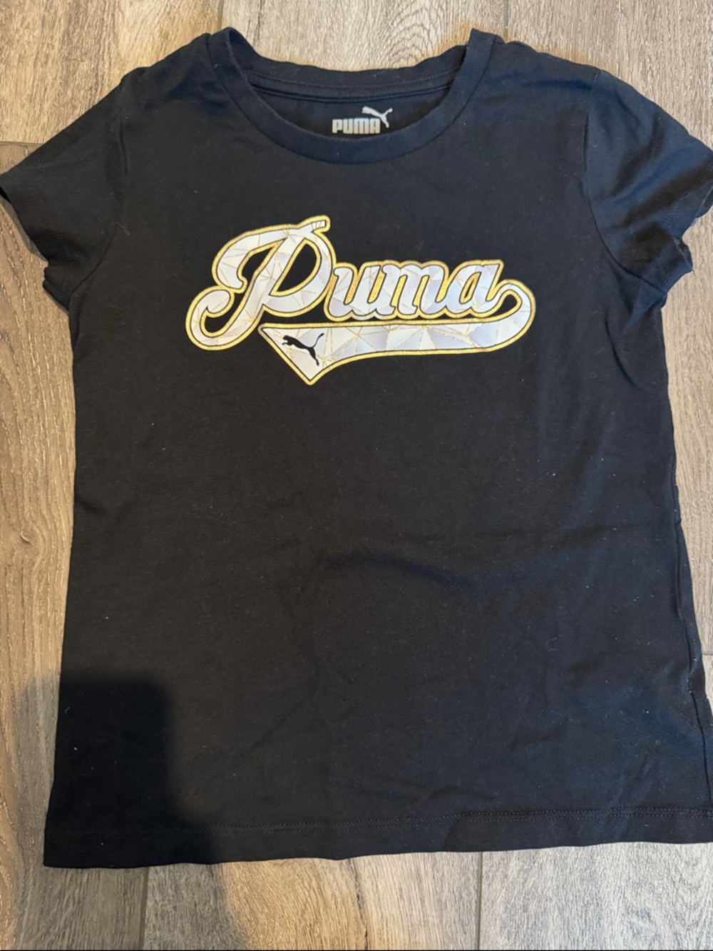 Puma Black Tee with Gold Script Logo